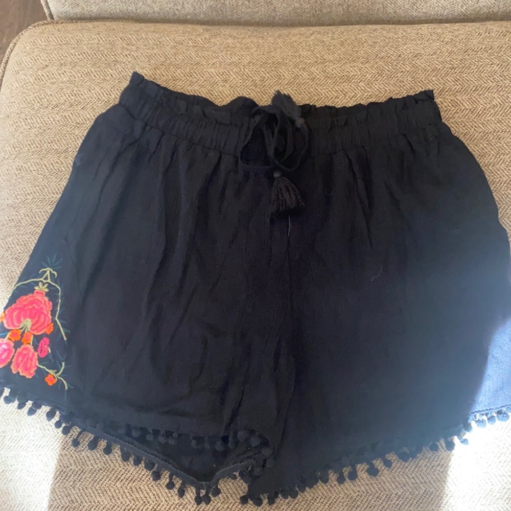 Black shorts with tassels and floral size small
